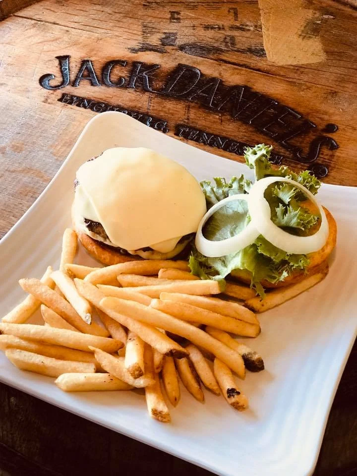 A burger and fries from Paradise Pub’s photo collection